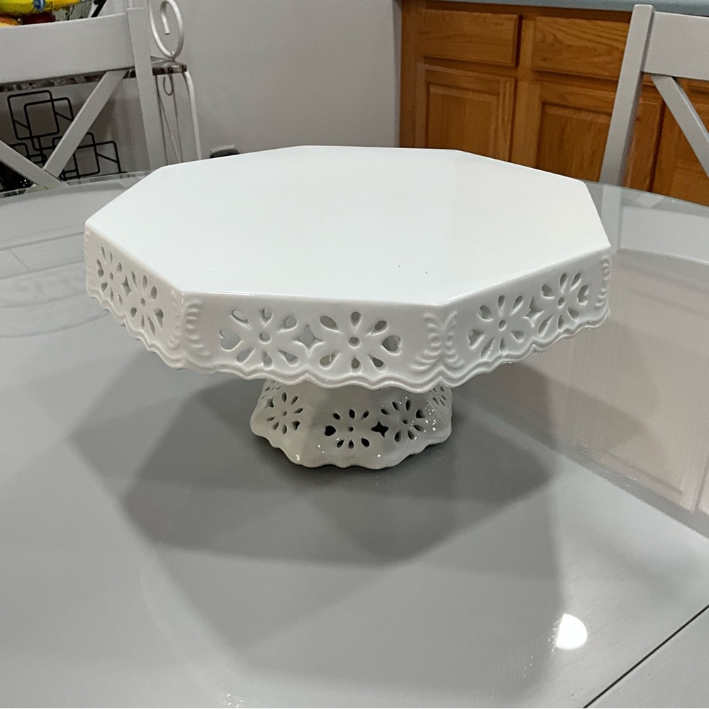 Beautiful Cake Server with cutout floral pattern.